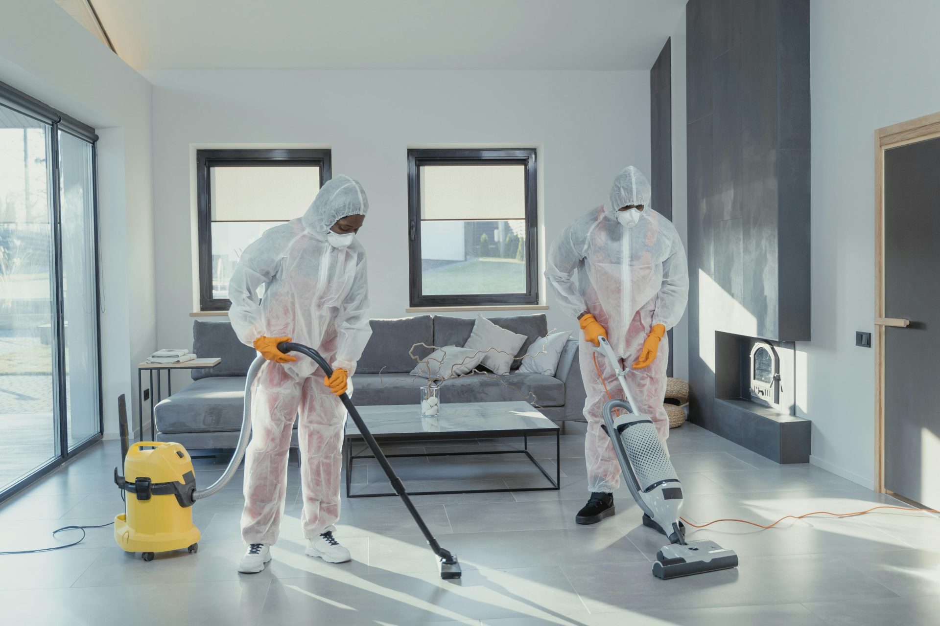 Man cleaning window with spray