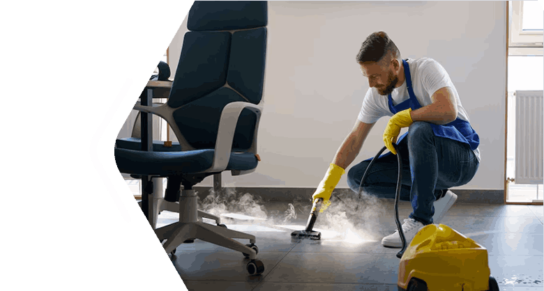Man cleaning window with spray